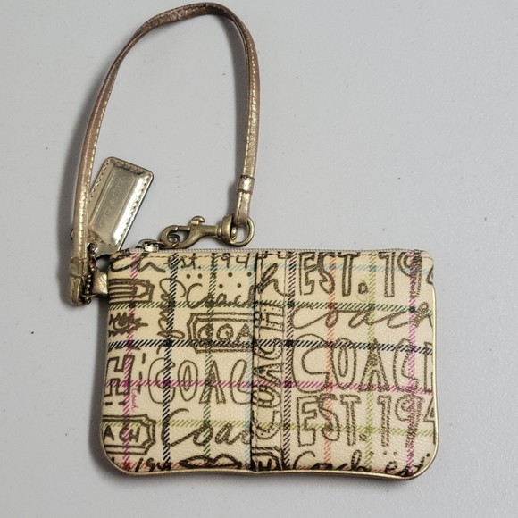 Coach Chelsea Graffiti Tattersall Wrislet. - Picture 1 of 16